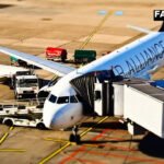 Commercial passenger airplane on airport tarmac representing akasa air rajasthan service launch