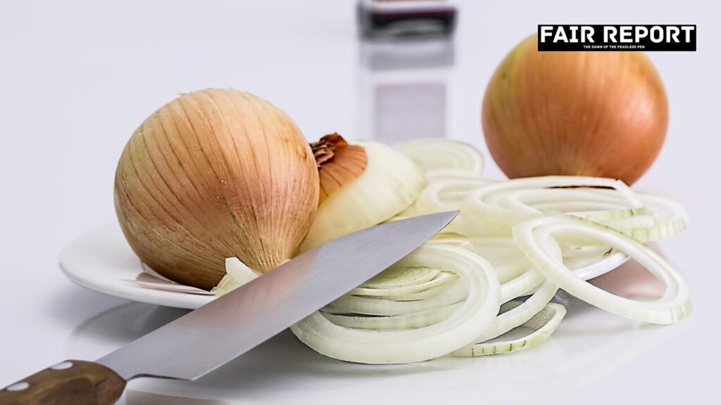 Close-up of red onions in a market reflecting India retail inflation