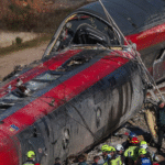 Emergency responders and rescue crews work around the damaged carriages of a high-speed train collision near Urda in Toledo province, Spain.